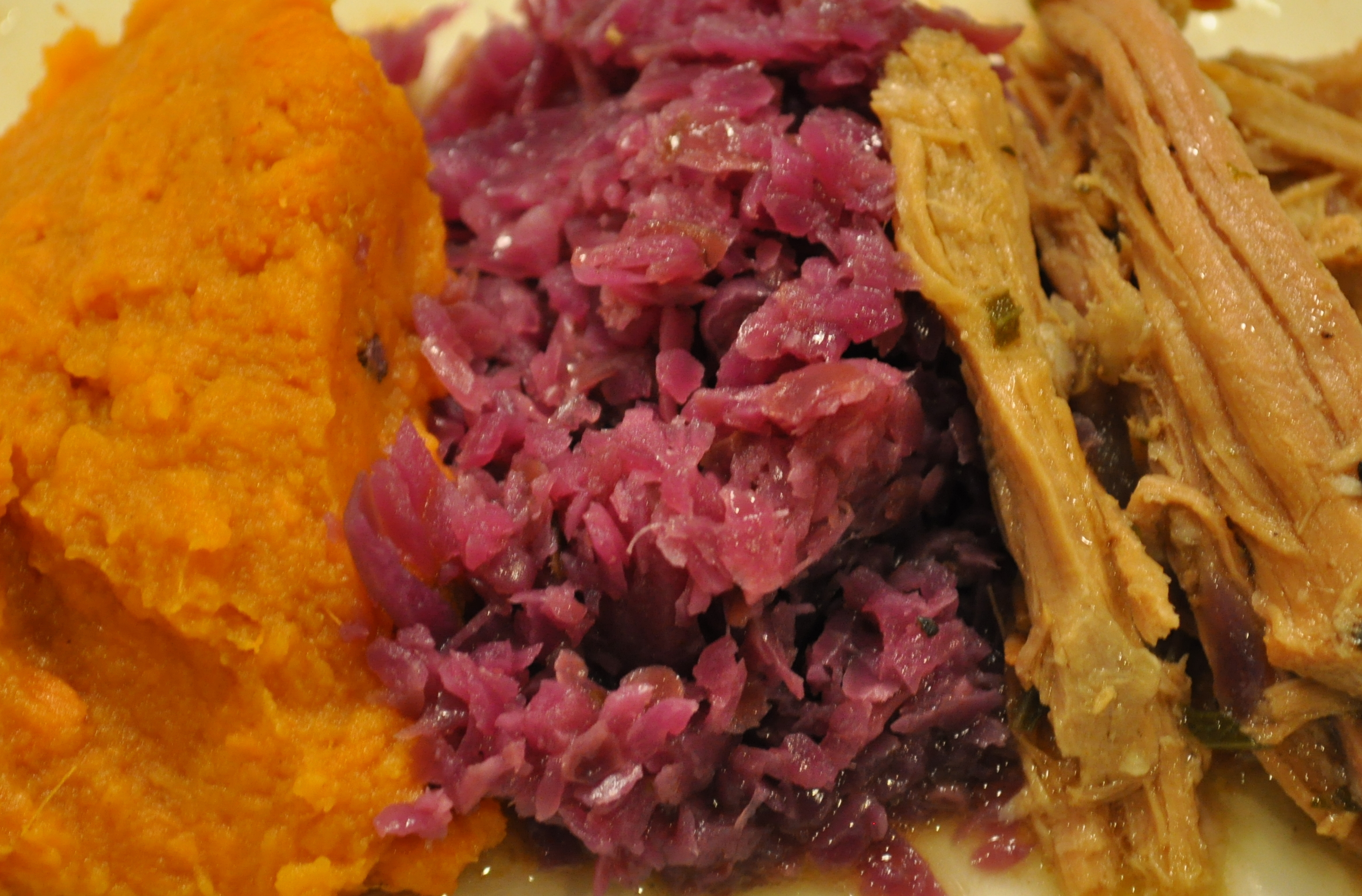 Braised red cabbage with mashed sweet potatoes and pulled pork